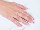 Golden Grace 18k Aparador Ring on hand with French-tip manicure