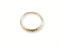 Golden Grace 18k Aparador Ring featuring a textured, faceted band, a timeless accessory crafted for elegance