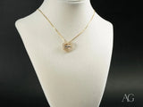 Golden Grace Jesus pendant: art gold jewelry with heart-shaped diamond