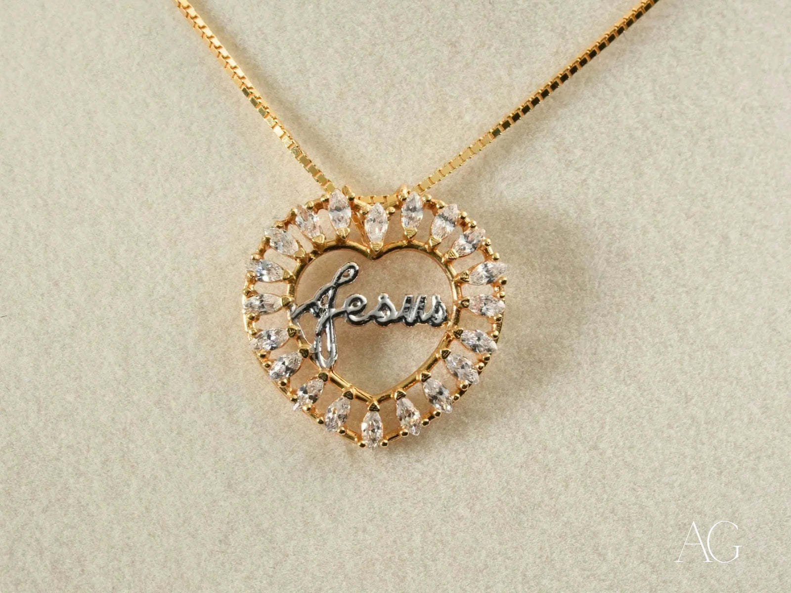 Golden Grace Jesus Pendant: Gold Heart with Gemstones and Jesus Inscription
