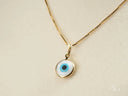 Golden Guardian evil eye pendant in gold chain necklace