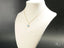 Gold chain necklace with blue evil eye pendant from Golden Guardian art gold jewelry