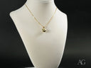18k solid gold heart pendant necklace on mannequin