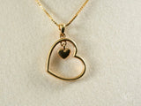 18k solid gold Golden Heart Pendant with inner charm