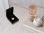 Golden heart pendant in black jewelry box showcasing 18k solid gold art gold jewelry