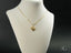 Elegant 18k solid gold golden heart pendant on delicate chain, ideal for art gold jewelry