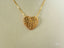 Art gold jewelry golden heart pendant in 18k solid gold with textured crisscross pattern