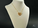18k solid gold heart pendant with textured surface on thin chain