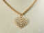 Elegant 18k solid gold Golden Hearts Pendant with a heart-shaped design of smaller hearts