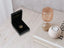 Open black velvet jewelry box with 18k solid gold Golden Hearts Pendant featuring art gold jewelry