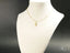 Gold chain necklace with ornate seahorse pendant, part of the Golden Lady Pendant art gold jewelry collection in 18k solid gold