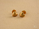 Matte gold heart-shaped stud earrings in 18k gold heart design