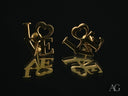 Radiant 18k gold LOVE stud earrings with heart O’s
