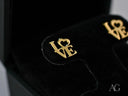 Radiant 18k gold LOVE stud earrings with heart O design