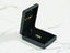 Open black jewelry box with 18k solid gold golden love pendant featuring a teddy bear charm