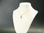 Golden Love Pendant featuring girl-shaped pendant with pink stones in 18k solid gold art gold jewelry