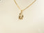Gold-toned art gold jewelry 18k solid gold mom pendant with mother and baby motif