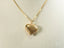 Shiny 18k solid gold heart pendant with diamond-cut textured surface, part of art gold jewelry collection
