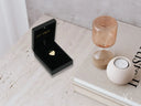 Golden love pendant: 18k solid gold heart in open black jewelry box