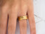 Golden Meridian gold wedding band with embedded diamonds, showcasing art gold jewelry elegance
