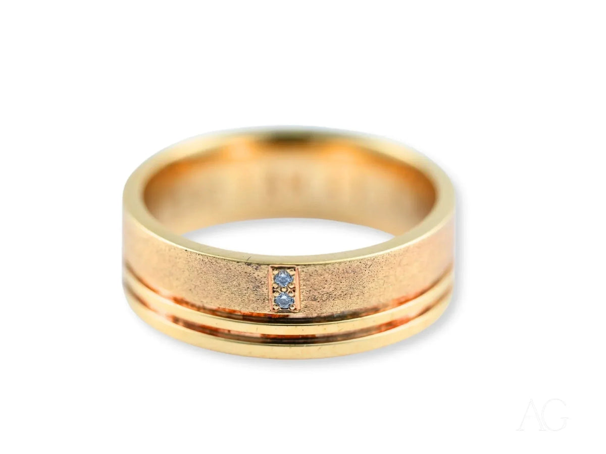 Golden Meridian gold wedding band with two diamond accents
