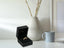 Open black ring box showcasing Golden Mesh Elegance Ring with intricate design and clear stones