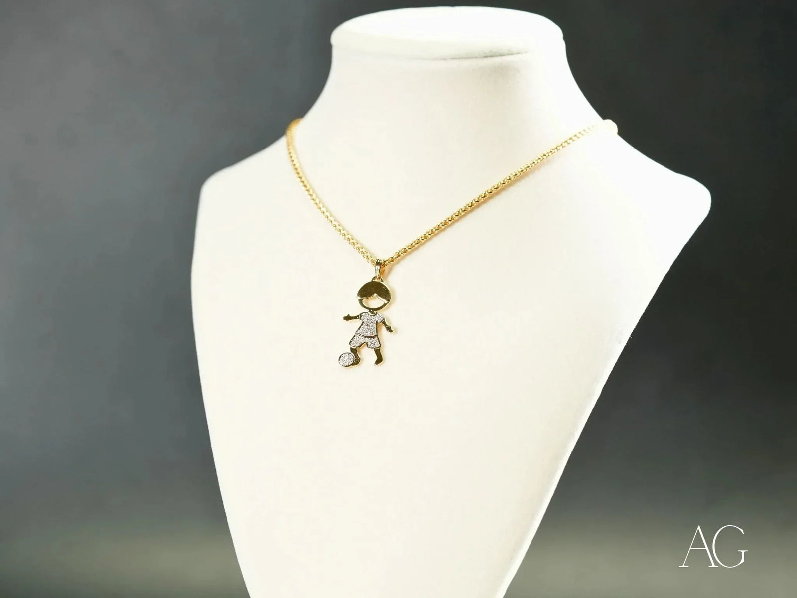 Golden Moments 18k gold CZ soccer boy pendant from Art Gold Jewelry
