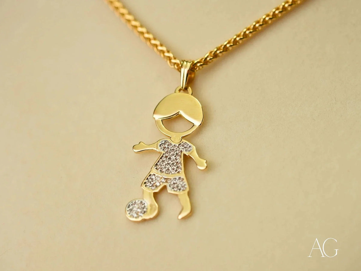 Golden Moments 18k gold CZ boy with ball pendant, art gold jewelry