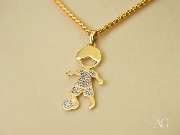 Golden Moments 18k gold CZ boy with ball pendant, art gold jewelry