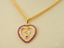 Golden Passion pendant: 18k gold heart with red CZ, girl silhouette, pink gems