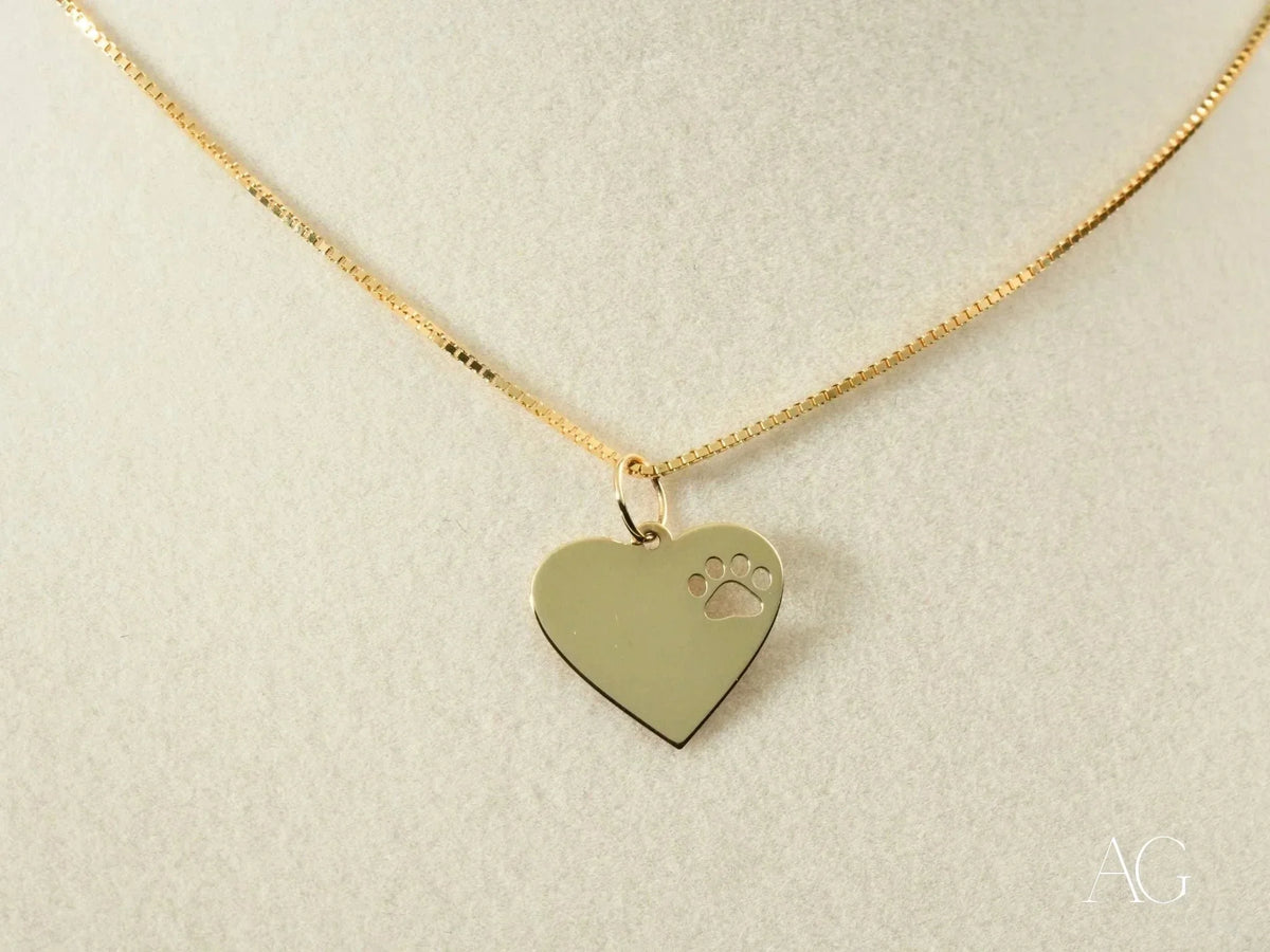Golden Paws pet lovers pendant: gold heart with paw print on chain