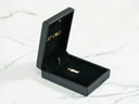 Open 18k solid gold Golden Play pendant in black jewelry box