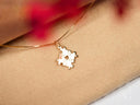 Golden puzzle piece necklace with heart cutout for autism awareness