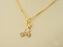 18k solid gold Golden Ride Pendant with child on bicycle