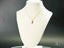 Golden Ruby Doll 18k gold chain necklace with multi-gemstone pendant showcasing art gold jewelry