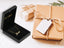 Golden Signature Necklace in black box with Julie nameplate and gift box