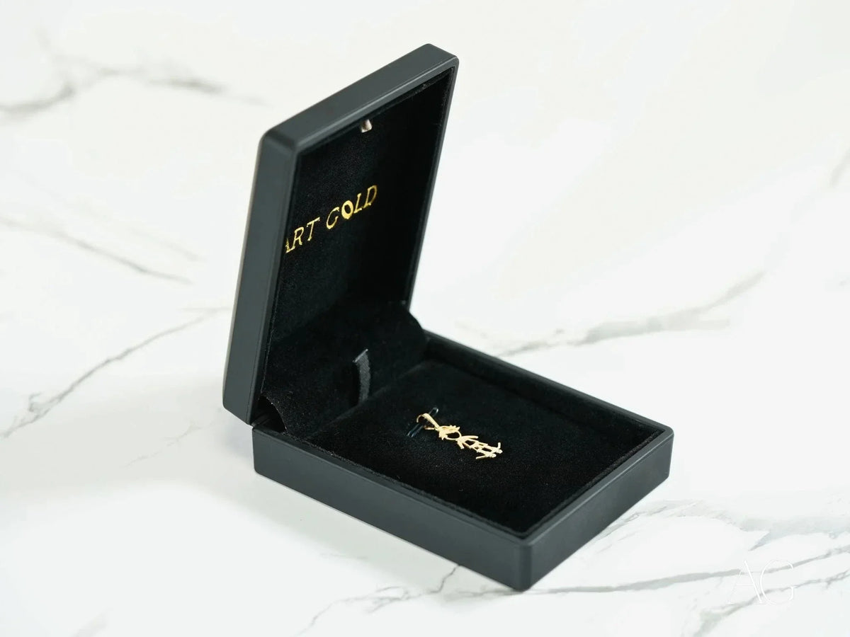 Open 18k solid gold skater pendant in black jewelry box