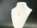 Golden Skater 18k solid gold necklace with sparkly skate pendant