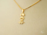 Golden Skater pendant: 18k solid gold boy on skateboard