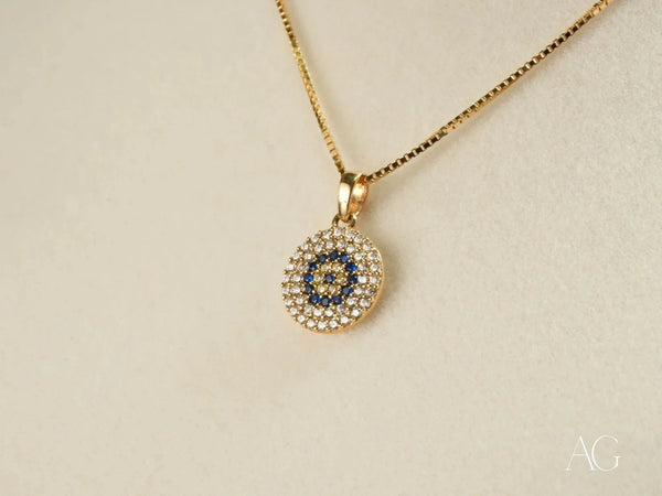 Golden Spark Pendant: 18k solid gold evil eye necklace with blue gemstones
