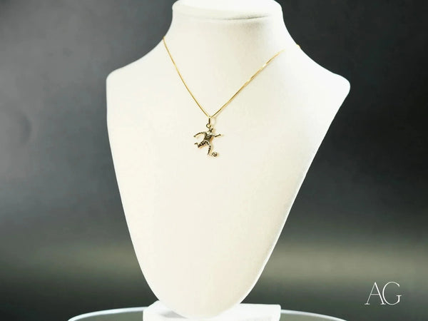 Golden Striker 18k gold boy soccer pendant on delicate chain