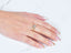 Golden Trio three gold tones hearts ring with geometric design worn on finger