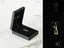 Golden vision pendant glasses pendant in black velvet box showcasing art gold jewelry craftsmanship