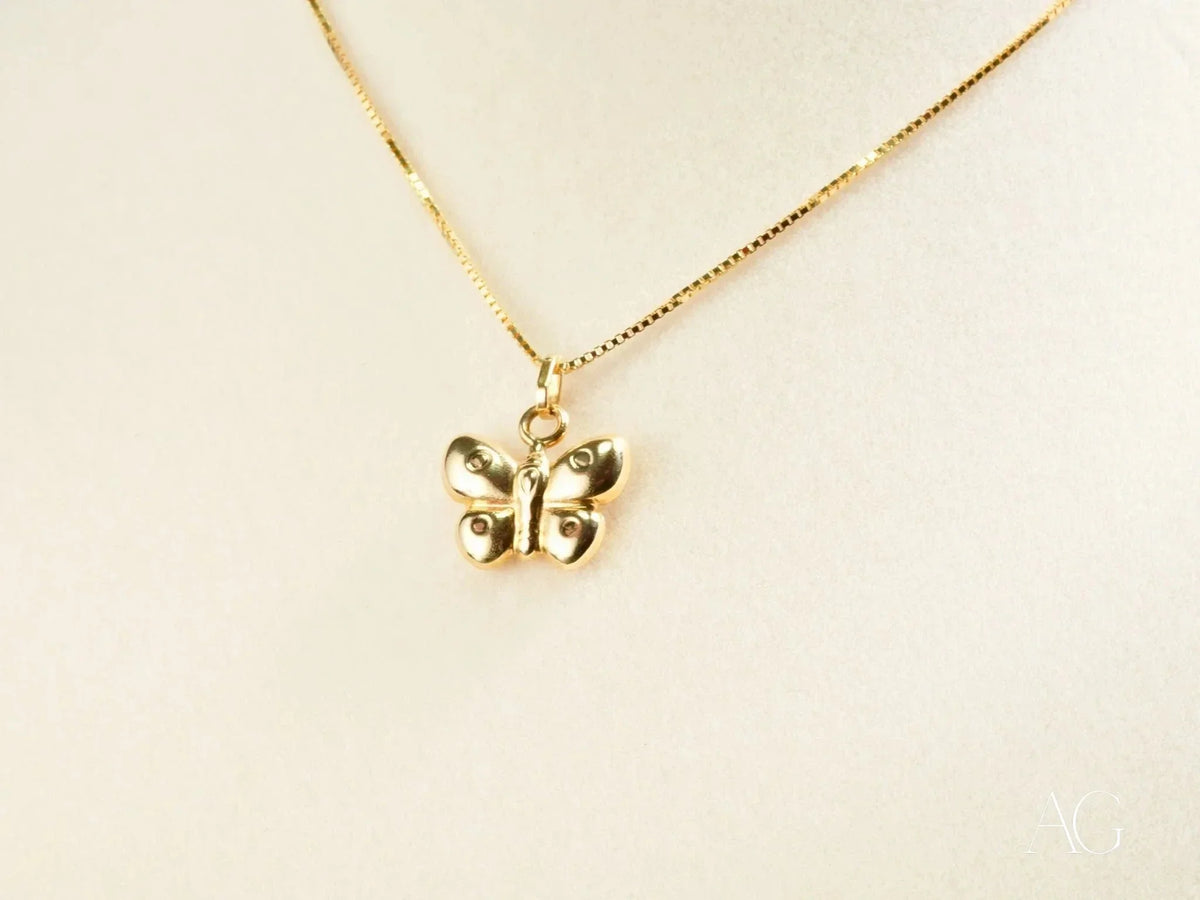 Golden Wings butterfly pendant in art gold jewelry with gem accents