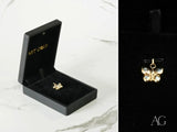 Golden Wings butterfly pendant in art gold jewelry with clear and light blue gemstones
