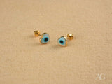 Gold heart evil eye earrings in 18k gold-plated heart studs with blue design
