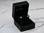 Open black velvet jewelry box with white heart-shaped evil eye earrings from Guardian Love collection