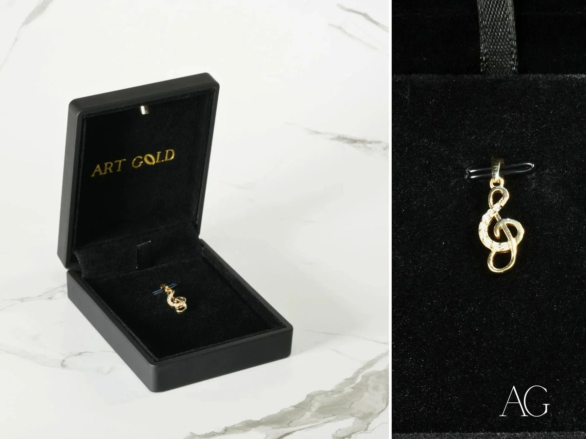 Gold treble clef pendant in Harmonic Elegance, art gold jewelry with gems
