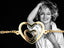 18k yellow gold heart bracelet with intertwined hearts and diamond from 4H’s Collection