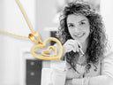 14k yellow gold heart diamond pendant with nested radiant heart diamond